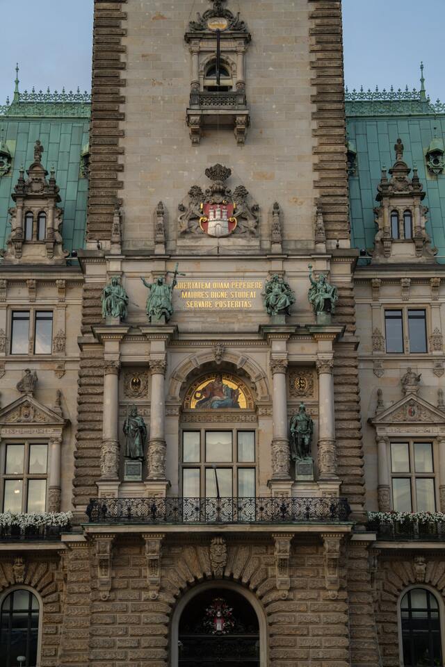 Facade at the main entrance to the Rathaus with painting and sculptures