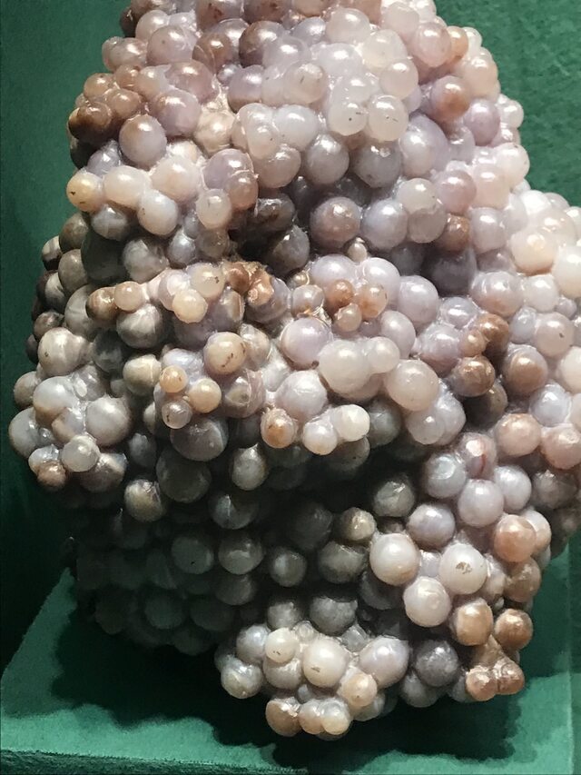 An unusual white mineral that looks like a huge bunch of grapes