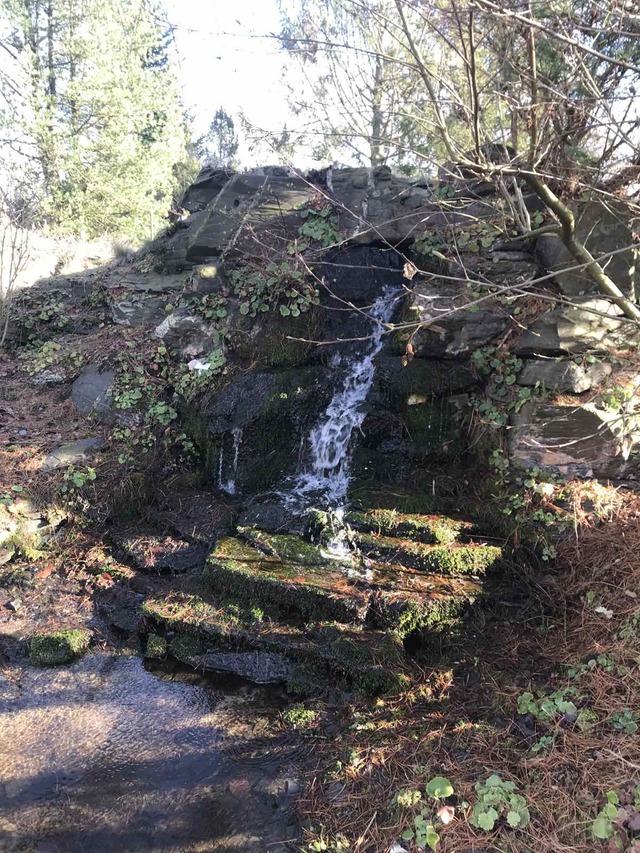 Small waterfall with large rocks